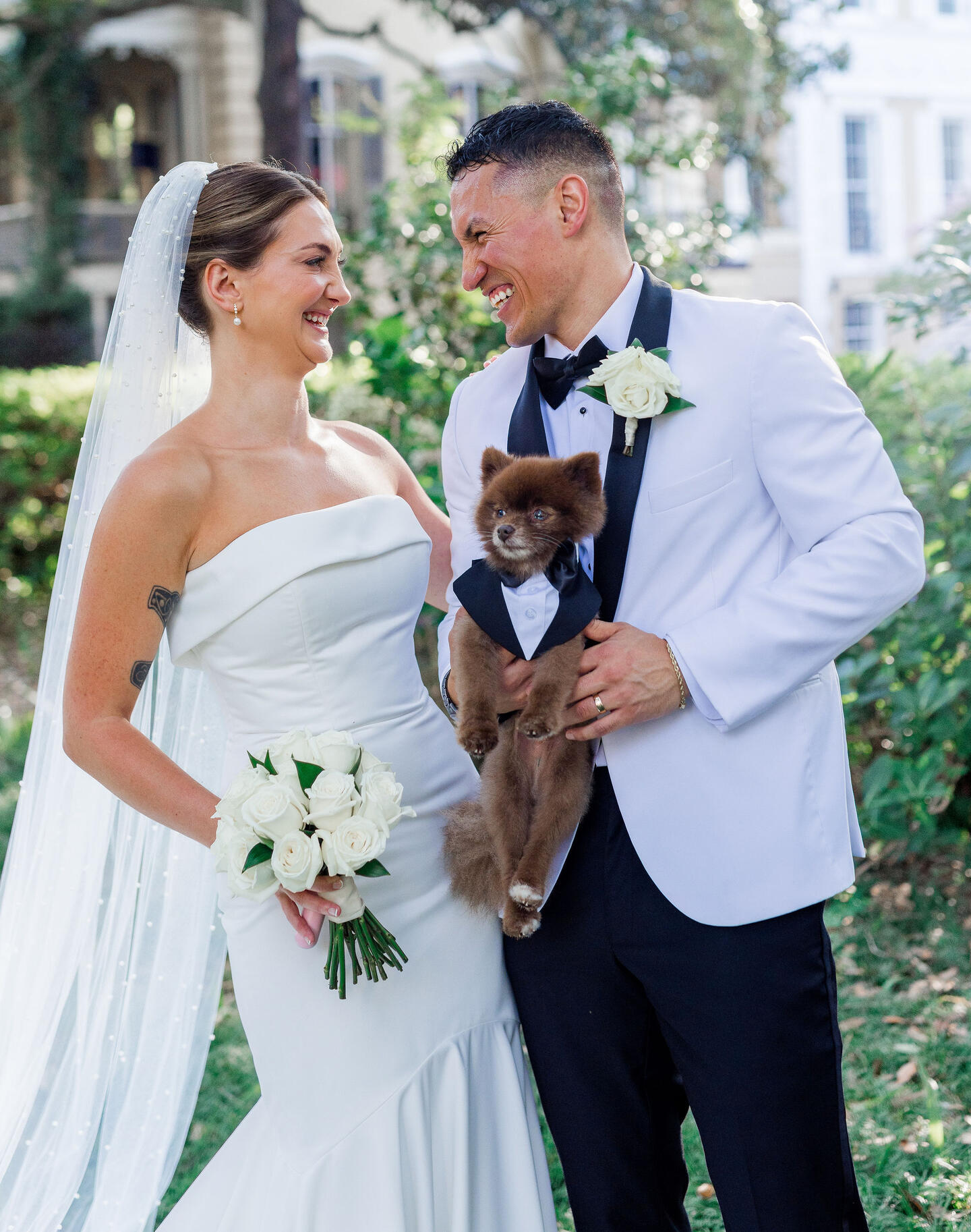 Newlyweds holding hands, celebrating their wedding day in Savannah